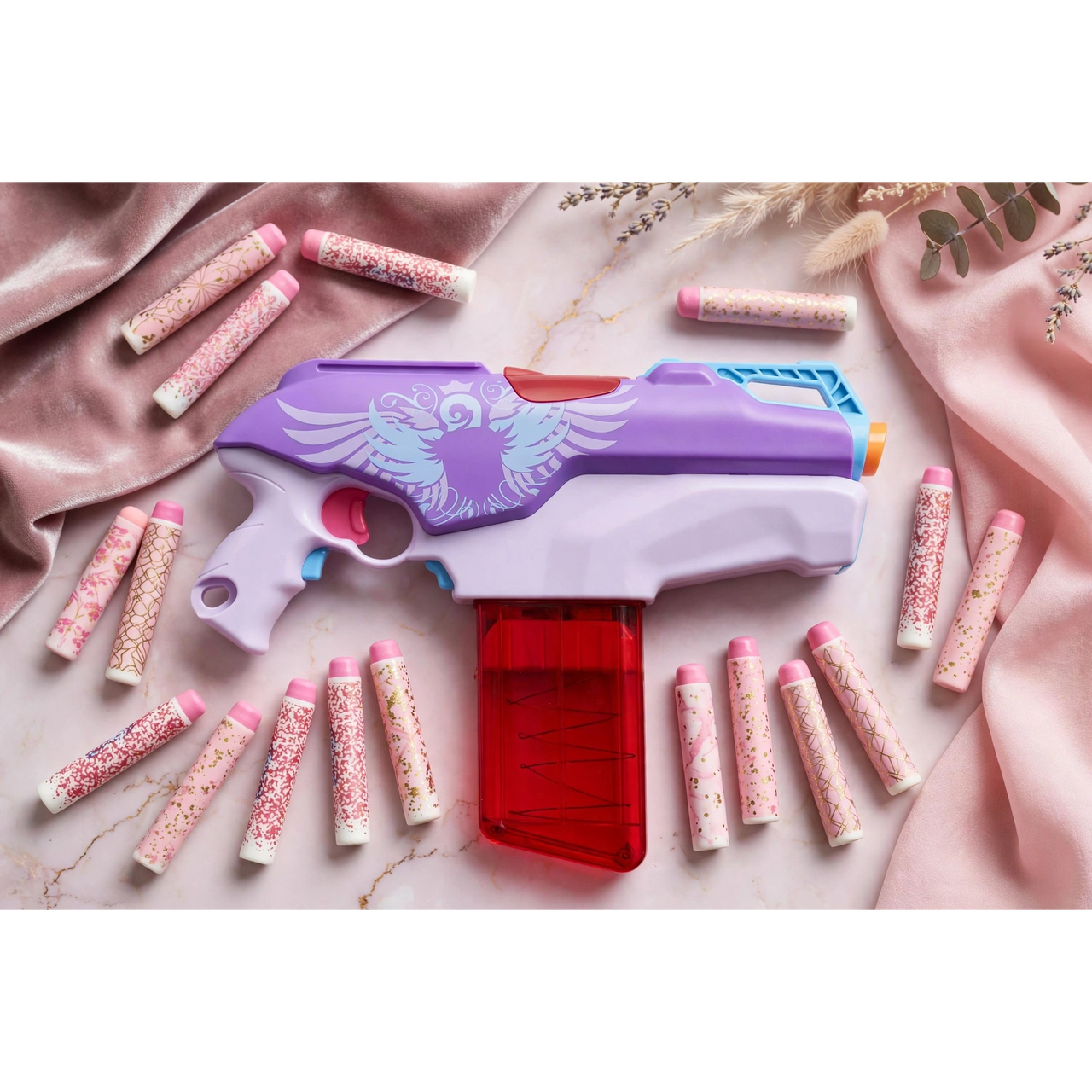 Nerf Rebelle Super Stripes Wild Glam Blaster Set by Hasbro — in use