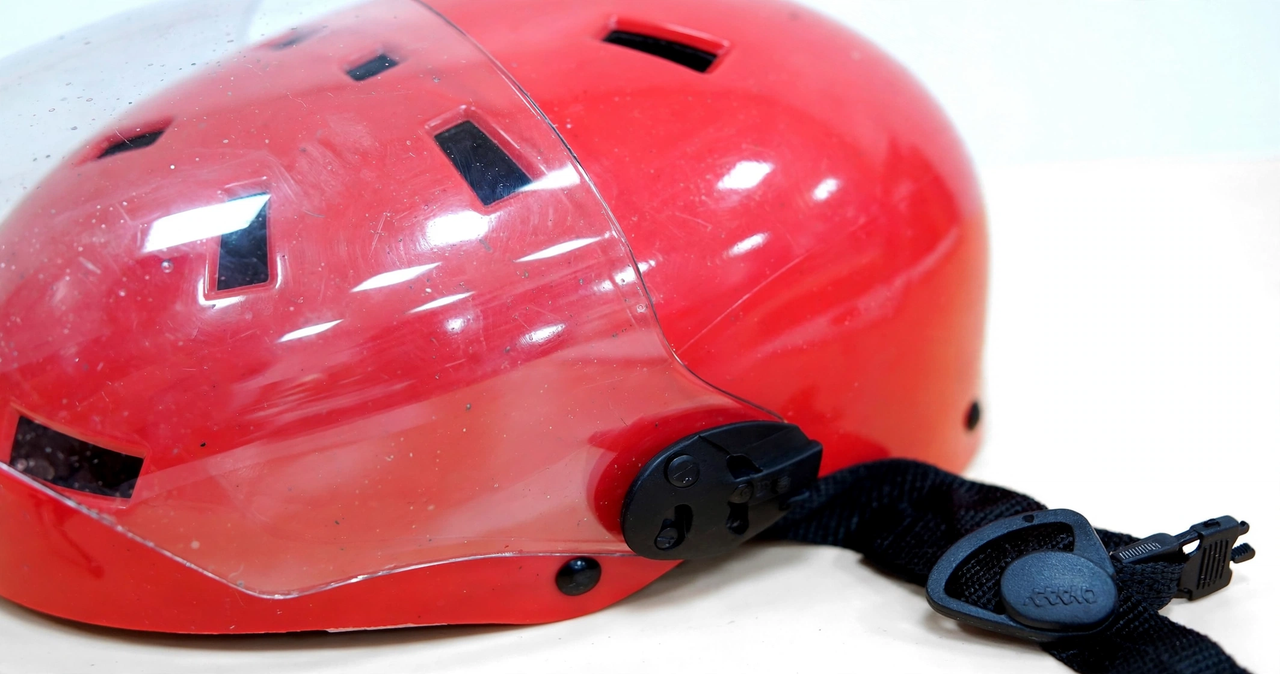 Close-up of helmet straps and ventilation slots