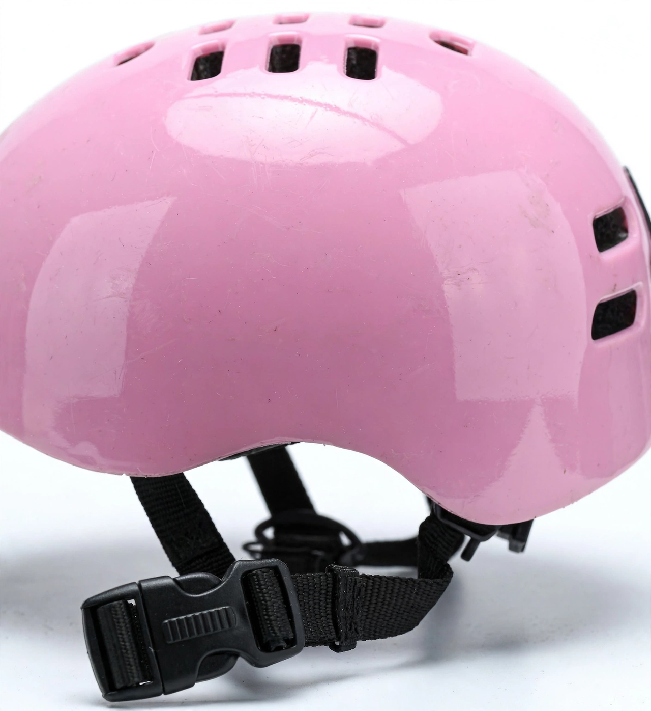 Close-up of helmet straps and ventilation slots