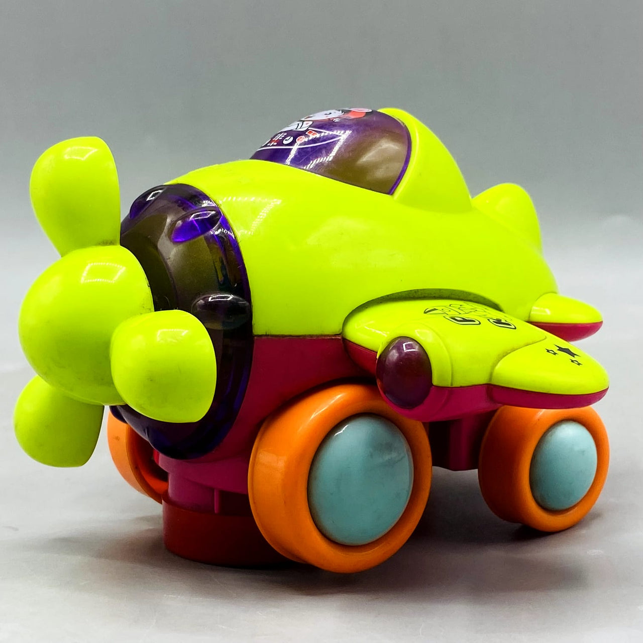 Bright Neon Propeller Airplane Push-and-Go Toy with Lights & Sound