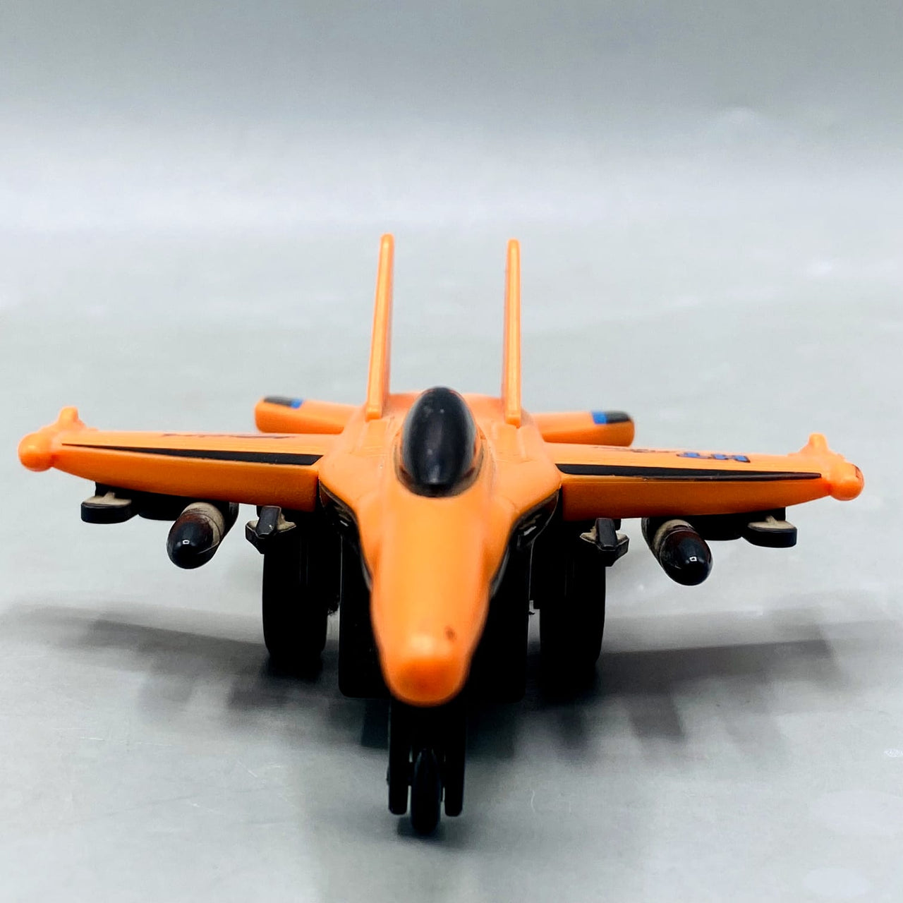 🚀 Orange "HT Fighter" Die-Cast/Plastic Jet with Missile Details