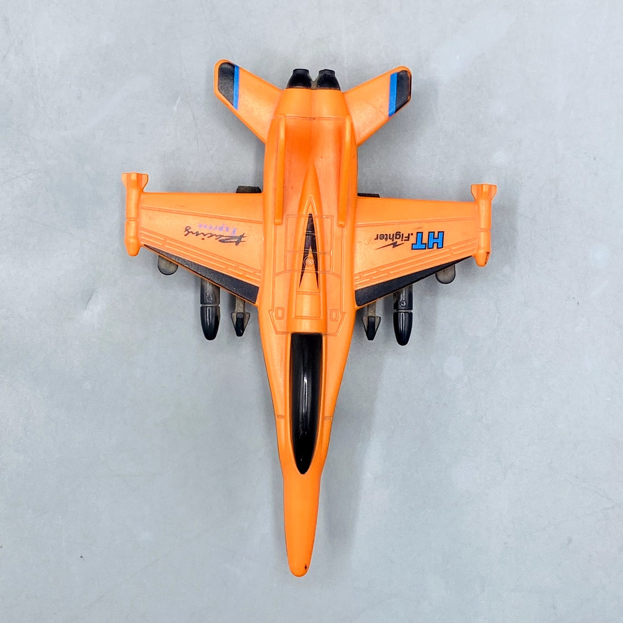🚀 Orange "HT Fighter" Die-Cast/Plastic Jet with Missile Details