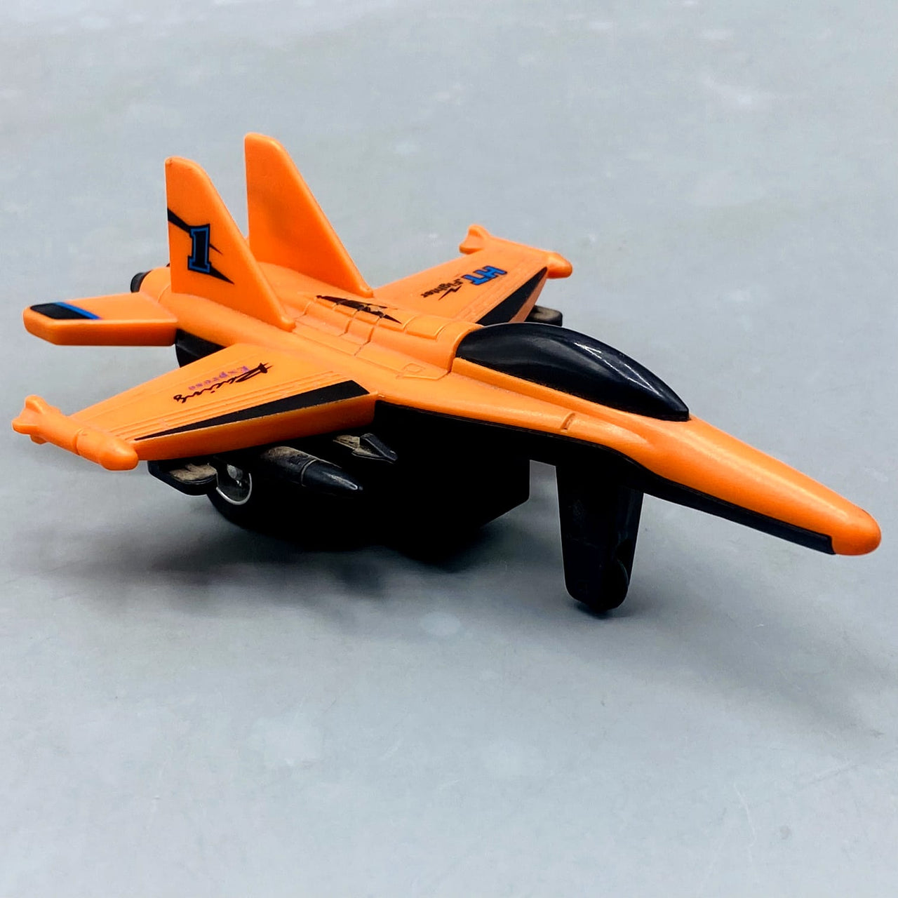 🚀 Orange "HT Fighter" Die-Cast/Plastic Jet with Missile Details