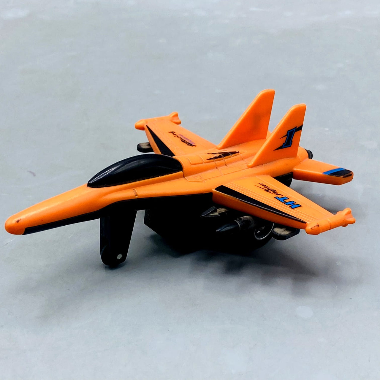 🚀 Orange "HT Fighter" Die-Cast/Plastic Jet with Missile Details