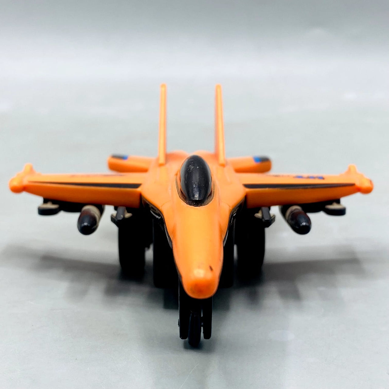 🚀 Orange "HT Fighter" Die-Cast/Plastic Jet with Missile Details