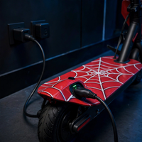 Thumbnail for Volt X electric scooter charging at a wall outlet