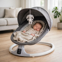 Thumbnail for Newborn sleeping in the Kidilo dark gray electric baby swing