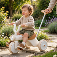 Thumbnail for Children's Musical Light-Up Tricycle - parent pushing in garden