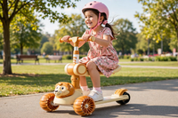 Thumbnail for Little girl sitting on the seat riding the Lovely Lion Scooty in a sunny park