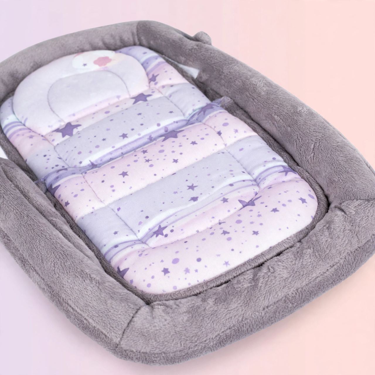 Close-up of the purple star print cushion