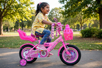 Thumbnail for Girl riding the pink and purple Barbie 20-inch bicycle in a park