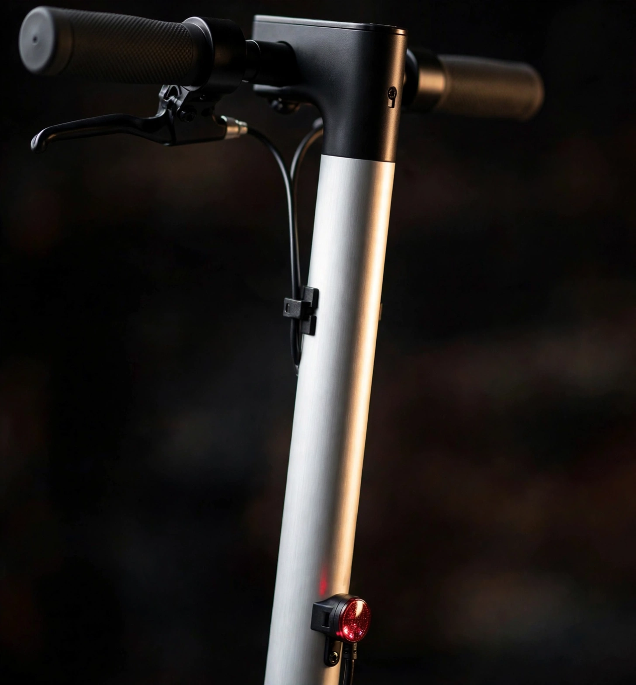 Close-up of the electric scooty's handlebar and front column