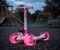 Thumbnail for Lovely Pink Doll Scooty with glowing flash wheels at dusk