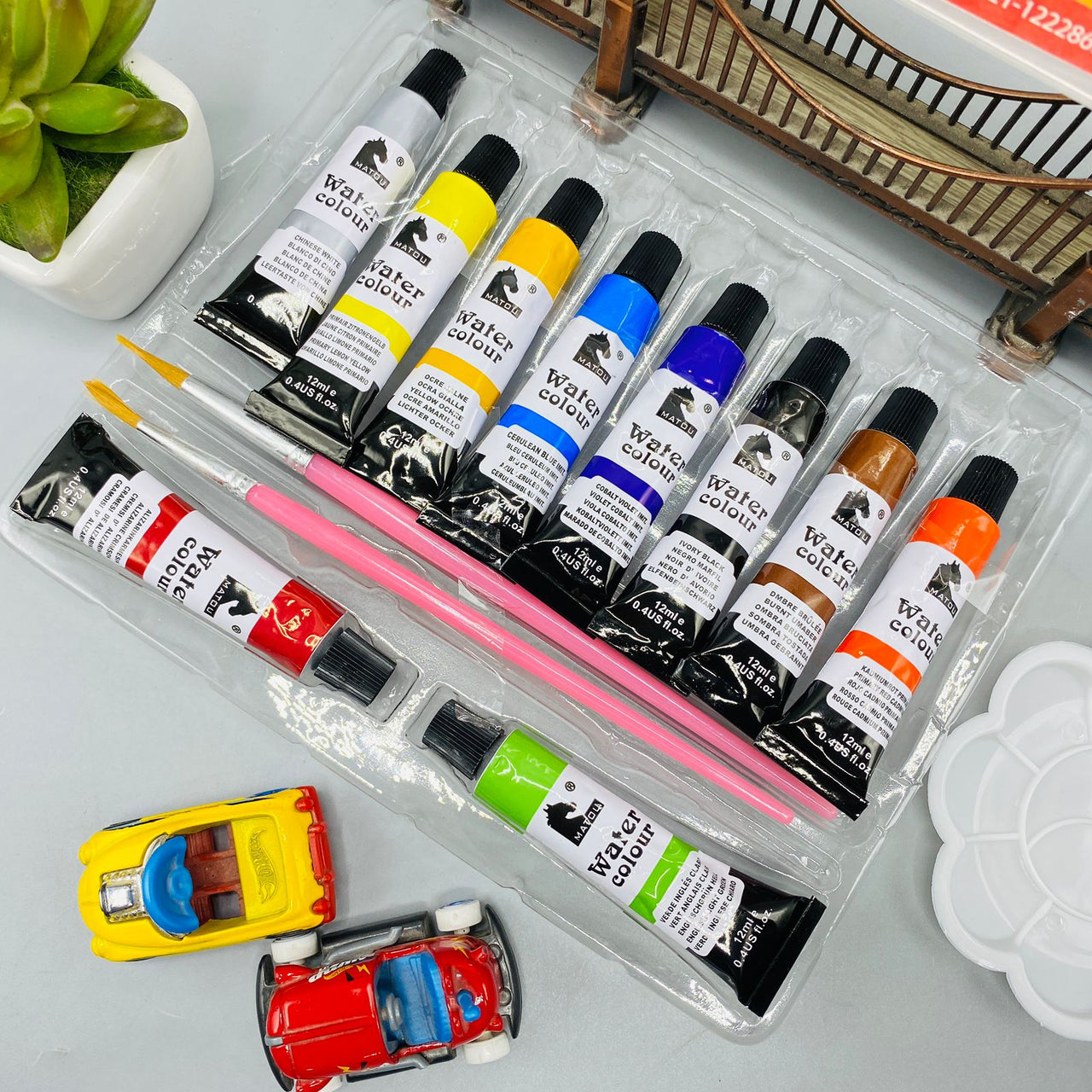 8 pieces watercolor tubes with 2 paint brushes and palette