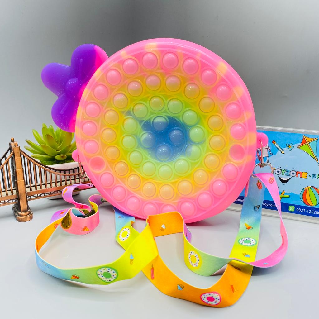 pop it fidget lollipop shape sling bag